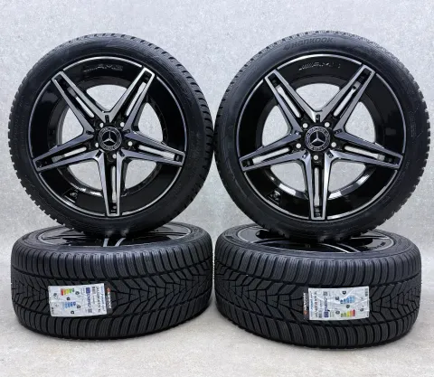 Background image for Original Mercedes W206 C Klasse 18 Zoll 5-Doppelspeichen-Rad Winter + RDKS A2064011700 Schwarz Glanzgedreht Neu